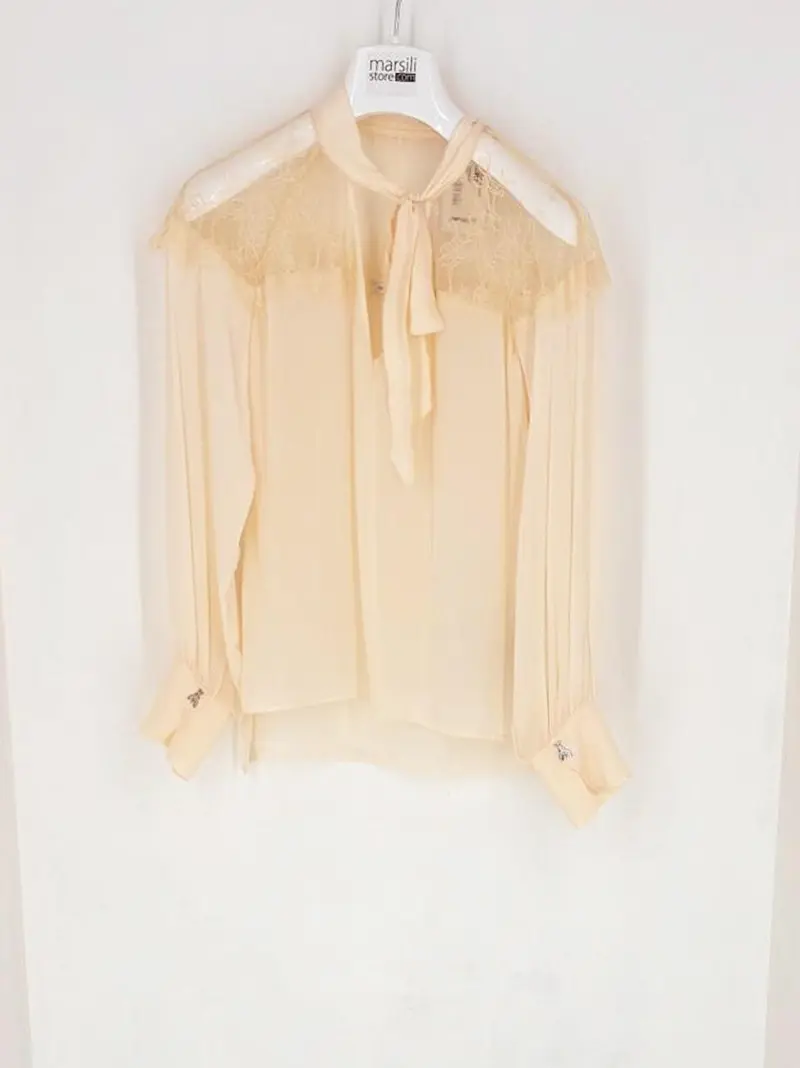 blusa fluida con fiocco