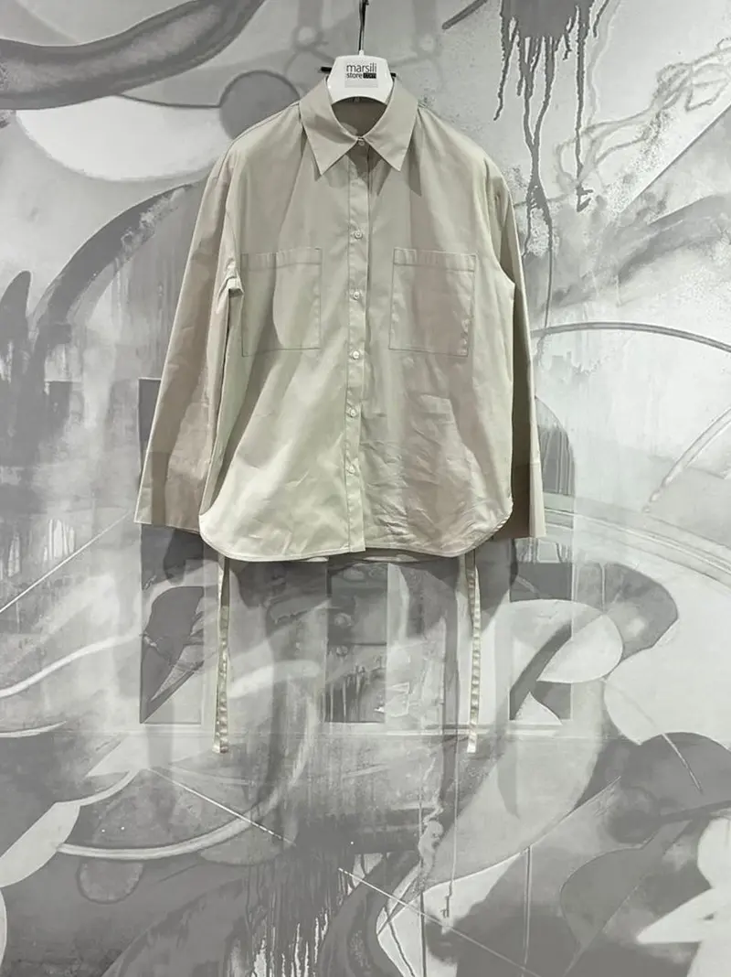 camicia over polsini