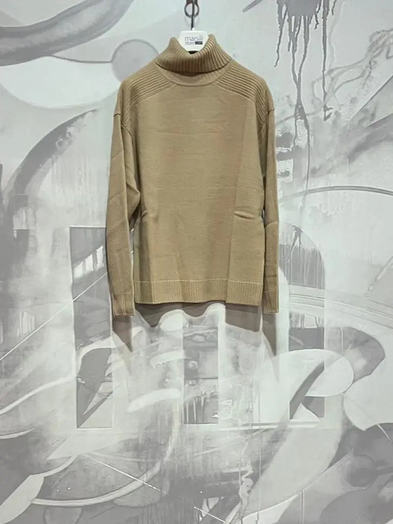 maglia spalla sella collo alto