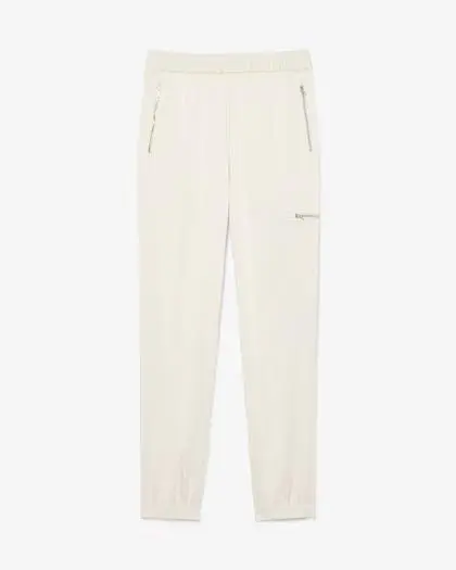 Pantaloni fluidi con tasca e zip
