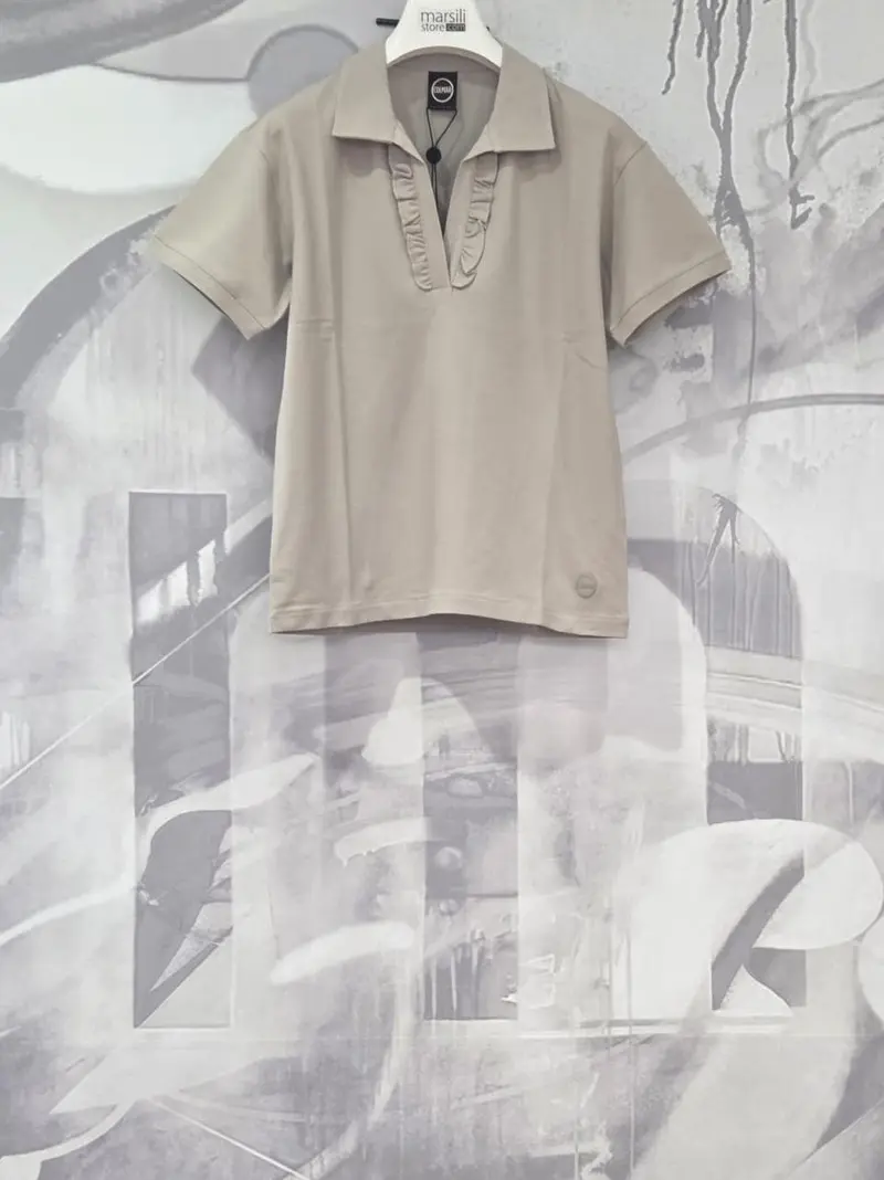 polo in pioquet con jabot