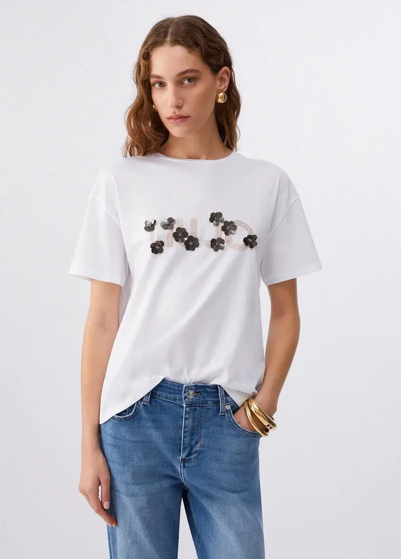 T-shirt con applicazioni di pietre preziose